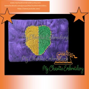 May include: A purple, rectangular embroidered item with a heart-shaped design split into yellow and green halves. The design is outlined with small yellow beads. The text "My Chaotic Embroidery" is embroidered on the item.