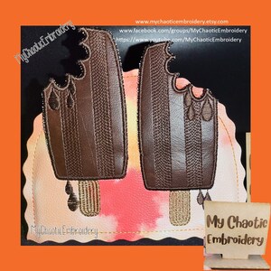 May include: Two embroidered patches of chocolate popsicles with a bite taken out of them. The popsicles are brown with white stripes and have a gold stick. The patches are on a pink and orange tie-dye background. The text "My Chaotic Embroidery" is on the bottom left and right of the image.