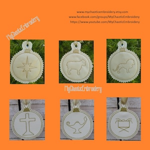 May include: Six white felt ornaments with gold embroidery depicting religious symbols. The ornaments include a star, a lamb, a lion, a cross, a lamp, and a manger.