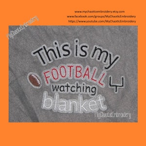 May include: Gray embroidered blanket with the text "This is my football watching blanket" and a football graphic. The text "MyChaoticEmbroidery" is also embroidered on the blanket.