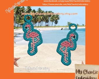 May include: Two pink flamingo embroidery designs with turquoise outlines. The designs are on a white background with a beach scene in the background. The text "MyChaoticEmbroidery" is at the bottom of the image.