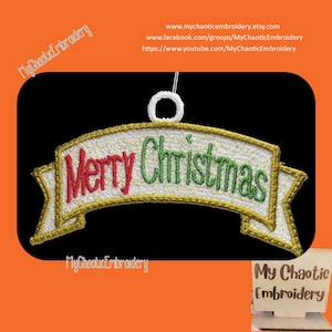 May include: A white banner with gold trim and the words "Merry Christmas" embroidered in red and green. The banner is shaped like an ornament and has a loop at the top for hanging.