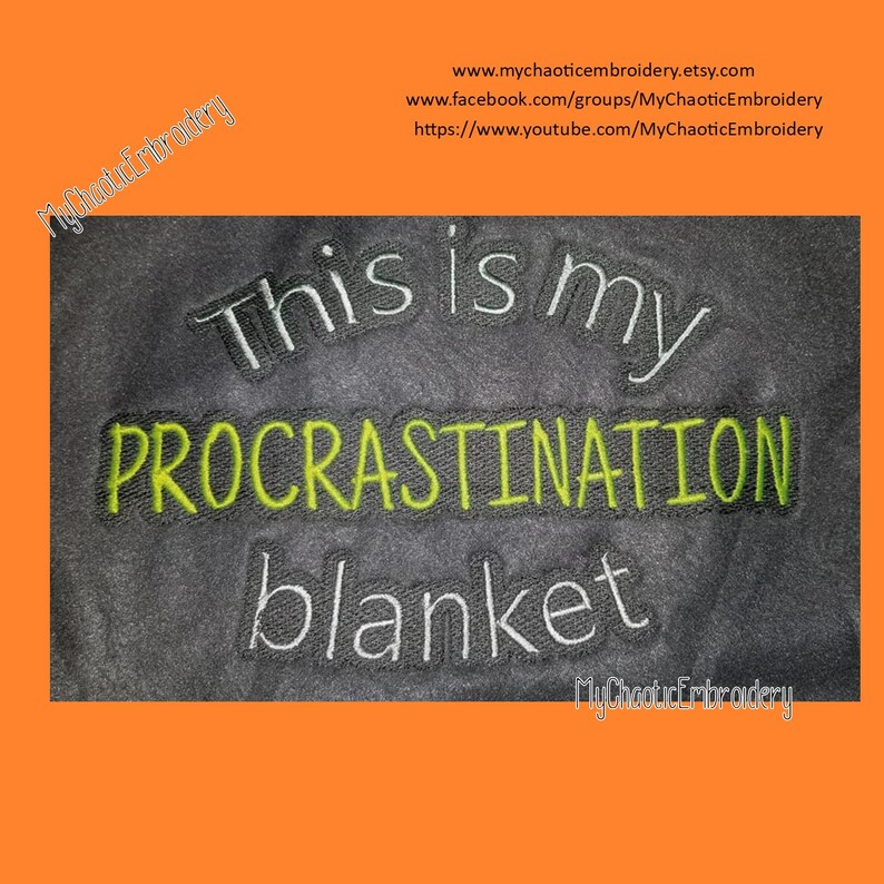 May include: A grey blanket with the text "This is my procrastination blanket" embroidered in white and green thread.
