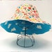 Riviera 1970 Bucket Hat - Happy & Clouds