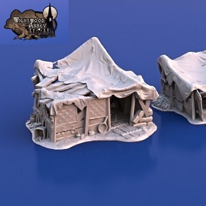 May include: Two small, dilapidated, wooden structures with thatched roofs. The structures are made of rough-hewn wood and have a rustic, weathered appearance. The roofs are covered in a tattered, brown material that appears to be made of cloth or canvas. The structures are set against a blue background.