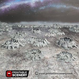May include: A tabletop terrain set depicting a lunar landscape with craters. The grey craters are textured and detailed, set against a backdrop of a starry night sky. The Printable Scenery logo is visible in the lower left corner.