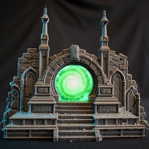 May include: A 3D printed miniature of a ruined stone archway with a glowing green portal. The archway is flanked by two tall towers and has a set of steps leading up to the portal.