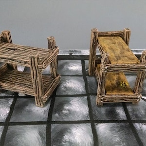 May include: Two wooden bunk beds with a rustic finish. The beds are made of rough-hewn planks and have a simple design.