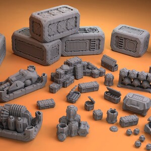 May include: A collection of gray, futuristic-looking crates and containers of various sizes and shapes. Some are stacked, while others are open, revealing smaller containers inside. There are also several cylindrical containers and a few small, round objects.