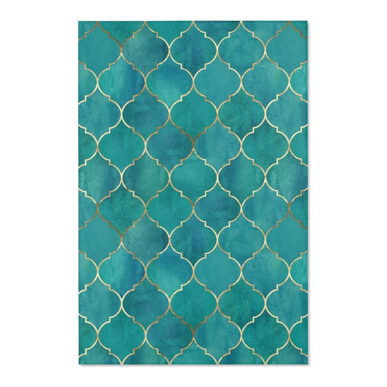 May include: Teal blue and gold geometric pattern with a repeating quatrefoil design. The pattern is reminiscent of traditional Moroccan tilework.