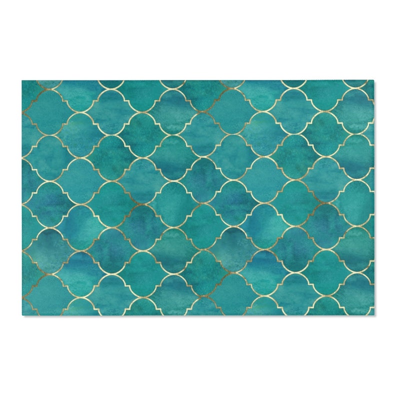 May include: Teal blue and gold geometric pattern with a watercolor effect. The pattern is made up of repeating squares with rounded corners and a gold outline.