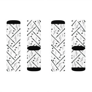 May include: White socks with a black musical instrument and musical note pattern. The socks have black heels and toes. The design features a repeating pattern of flutes and musical notes.