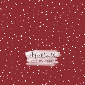 Puede incluir: Un fondo rojo con una pincelada blanca que dice "Mockturtle Pattern Studio" y un patrón disperso de puntos blancos.
