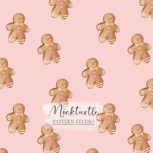 May include: A seamless pattern featuring gingerbread men on a pink background. The gingerbread men are brown with white icing and have a smiling face. The pattern is perfect for holiday crafts and projects.