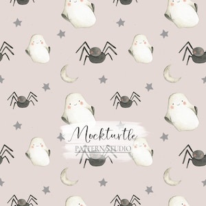 May include: A seamless pattern featuring white ghosts, black spiders, and silver stars on a light pink background. The pattern is repeated throughout the image. The text "Mockturtle PATTERN STUDIO" is written in black on a white brushstroke background.