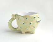 Fancy light green ceramic cup monster. Handmade pottery, cup with paws and teeth, creepy mug, original hand sculpted mug mutant, crazy cup