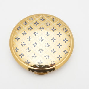 Laiton compact avec décor à motifs noir et blanc sur fond laiton fabriqué en, les années 50 par Kigu