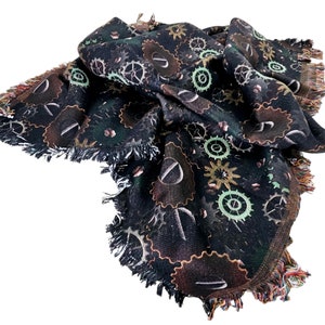 Manta Steampunk: Diseño de engranajes y ruedas, con detalles en azul oscuro