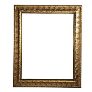 May include: A gold picture frame with an ornate design. The frame is empty and ready to display a photo or artwork.
