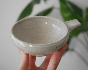 Rustic Studio Pottery Bowl with Handle, Speckled Off-White Glaze, Handmade Stoneware Dish, Small Artisan Serving or Decorative Bowl