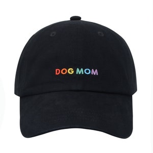 May include: A black baseball cap with the words "DOG MOM" embroidered in rainbow colors.