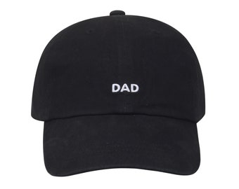 May include: A black baseball cap with a white embroidered "DAD" on the front.
