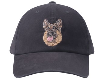 May include: A black baseball cap with an embroidered German Shepherd dog on the front.