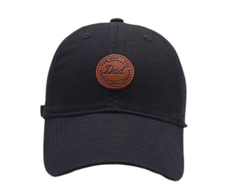 May include: Black baseball cap with a brown leather patch that says "The Man, The Myth, The Legend, Dad".