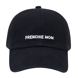 May include: Black baseball cap with white embroidered text that reads "FRENCHIE MOM".