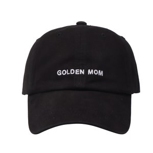 May include: Black baseball cap with white embroidered text that reads "GOLDEN MOM".