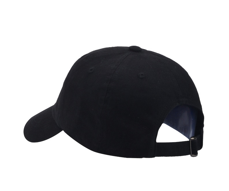 May include: A black baseball cap with a curved brim and an adjustable strap.