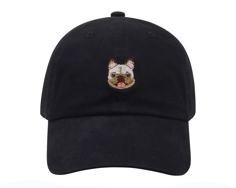 May include: A black baseball cap with an embroidered image of a French bulldog on the front.