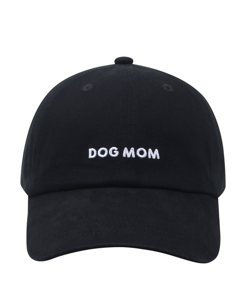 May include: A black baseball cap with white embroidered text that reads "DOG MOM".