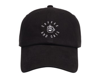 May include: Black baseball cap with white embroidery that reads "Coffee and Cats" with a coffee cup and paw print design.