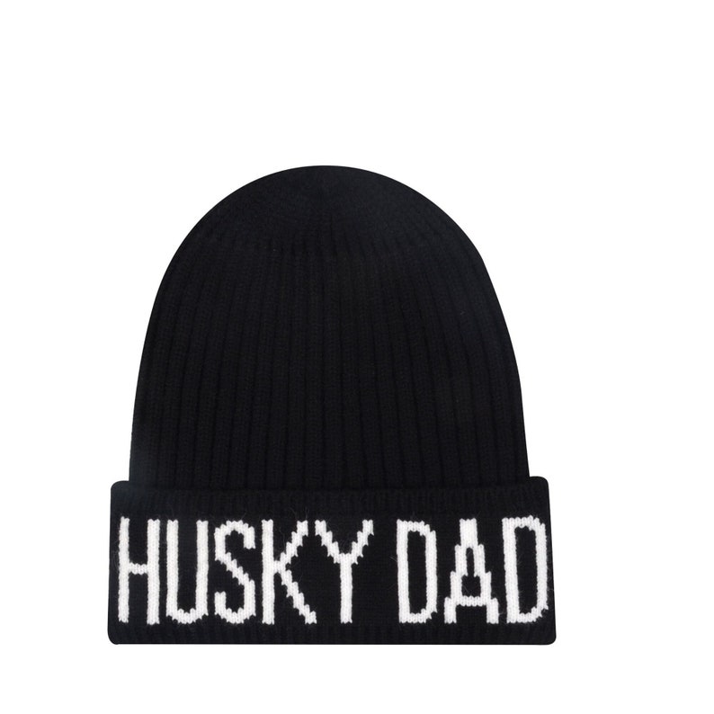 May include: Black knit beanie with a white "HUSKY DAD" embroidered on the cuff.
