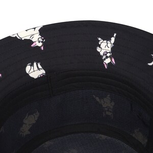 May include: Black bucket hat with a white and black French bulldog print. The hat has a mesh lining.