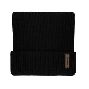 May include: A black knit beanie with a folded brim. A small brown rectangular tag with the text "CATROVERT" is sewn on the brim. The beanie is made of a thick, ribbed knit material.