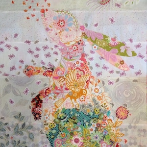 May include: A colorful patchwork rabbit made of fabric scraps with a floral design. The rabbit is standing on its hind legs with its front paws raised. The background is a light gray with a subtle floral pattern.