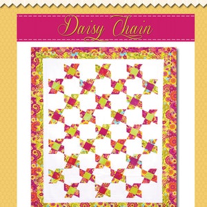 May include: A quilting pattern called "Daisy Chain" using 2 1/2 inch strips. The pattern features a white background with a repeating pattern of pink and yellow squares. The pattern is surrounded by a pink and yellow floral border.