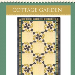 May include: A quilting pattern for a Cottage Garden quilt using 2 1/2 inch strips. The quilt features a yellow and black geometric design with a black and white border.