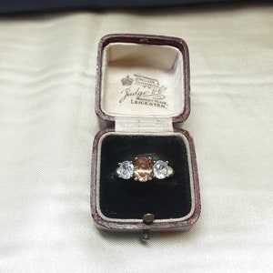 Sparkling Vintage Sterling Silver and Natural Cubic Zirconia Trilogy Ring.