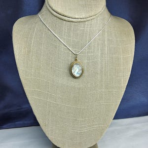 Stunning Victorian Antique, Women&#39;s 800 Silver and Carved Mother of Pearl Portrait Pendant with a Modern Sterling Silver Snake Chain.