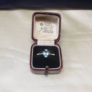 Superb Vintage Sterling Silver and Natural Faceted Ice Blue Topaz Solitaire Ring.