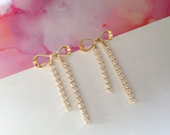 Pendientes de clip invisibles, pendientes de lazo dorado con diseño de diamantes