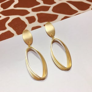 Invisible clip on earrings, Golden Rugby Shape Earrings