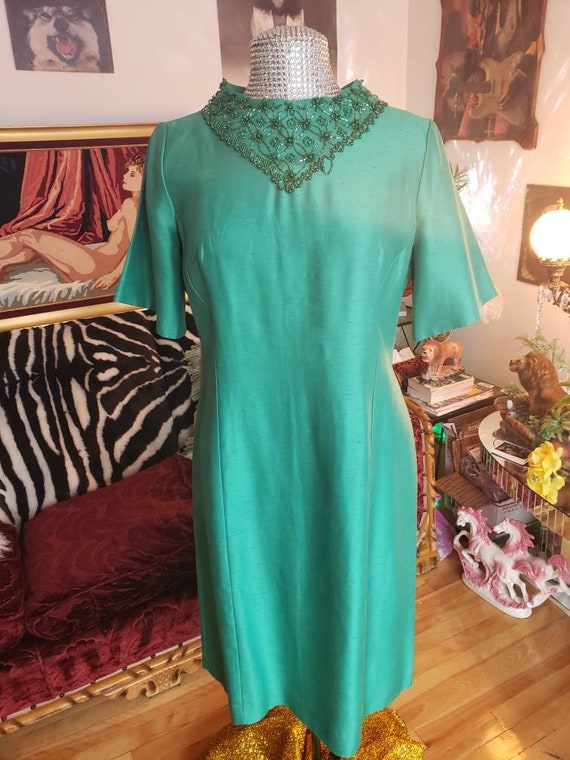 emerald green bell sleeve dress