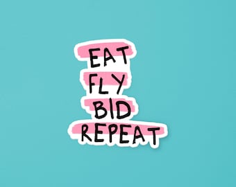 May include: A sticker featuring the black text EAT FLY BID REPEAT written in a hand-drawn style. Each word is placed over a horizontal, textured, light pink brushstroke. The sticker has a white border and is set against a solid turquoise background.