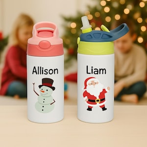 May include: Two white water bottles with colorful lids. One has a pink lid and the name "Allison" with a snowman graphic. The other has a blue and green lid and the name "Liam" with a Santa Claus graphic. Both bottles have a straw.