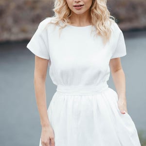 Linen wedding dress, back view showing waist tie detail