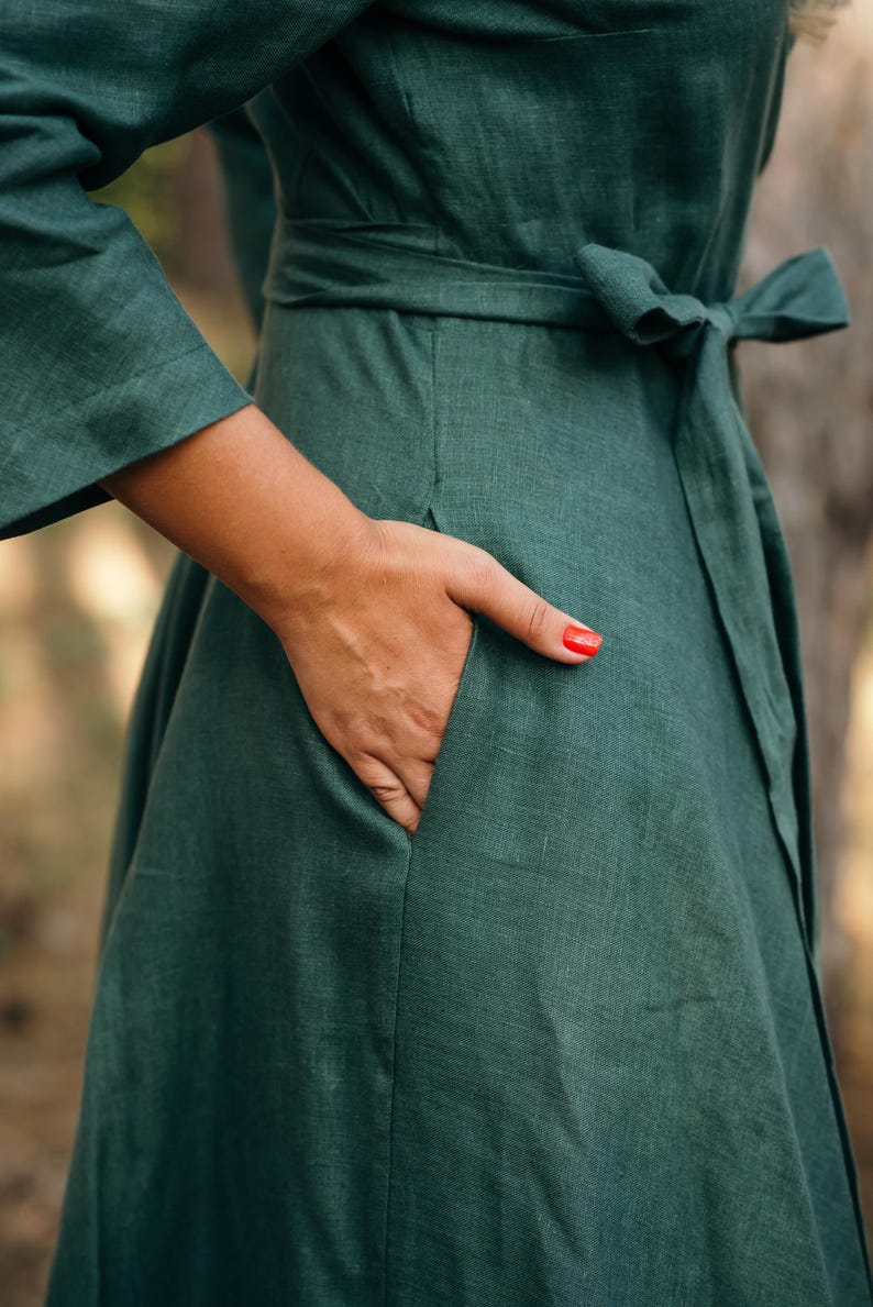 Green linen wrap dress for bridesmaids close up of a pocket